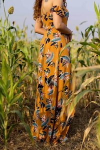 aleena Mackar from the style chair wearing designer wear spring summer collection walking across fields concept shoot with best Indian fashion photographer based in mumbai india