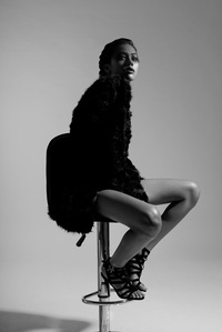 model sitting on chair black and white photoshoot by best indian black and white photographer based in mumbai