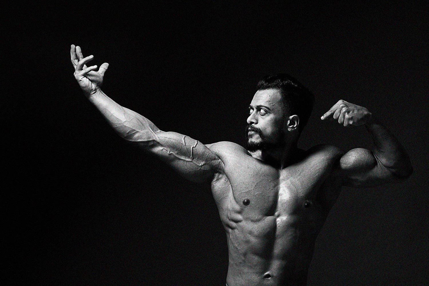 bodybuilder body show pose shot by top portrait photographer based in pune india