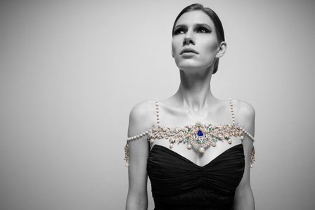 black and white jewellery photoshoot of model posing with signature jewellery piece photoshoot with the top indian fashion and jewellery photographer based in mumbai india