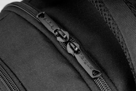 product photoshoot of the zips of a black bag shot in studio setup by leading product photographer ashish gurbani based in santacruz east mumbai india