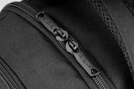 product photoshoot of the zips of a black bag shot in studio setup by leading product photographer ashish gurbani based in santacruz east mumbai india