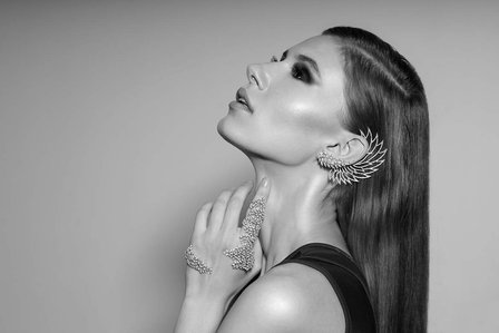 Amazing concept shoot of model posing with diamond jewelry with creative lighting in studio setup photoshoot by top indian jewelry photographer based in Mumbai India.