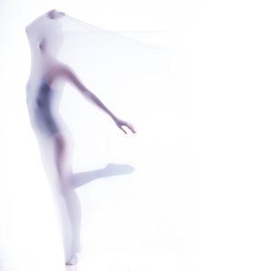 female model giving dancing pose while covered in lycra for concept based photoshoot by leading fashion photographer based in mumbai india