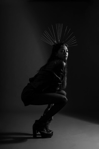 dusky indian model poses with headgear for leading indian fashion photographer based In mumbai india