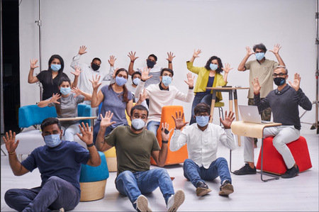 a team group photo wearing masks during covid times as a safety measure due to corona virus for a advertising campaign photoshoot by still life and product photographer ashish gurbani  with his team members.