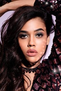 portrait of a leading fashion model wearing sequins dress by clothing brand shein photoshoot with leading advertising photographer based in mumbai india