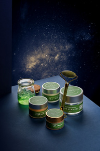 a group photograph of a brand variety of products shot on a conceptual galexy background with blue foam boards for a yearly brand campaign  shot by top luxury prodcut photographer based in pune india