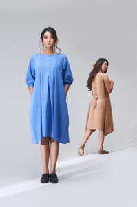 beautiful female model Vaishnavi patwardhan wearing blue and brown minimalistic modern clothing for studio photographer ashish gurbani who is the trending commercial photographer based in pune india