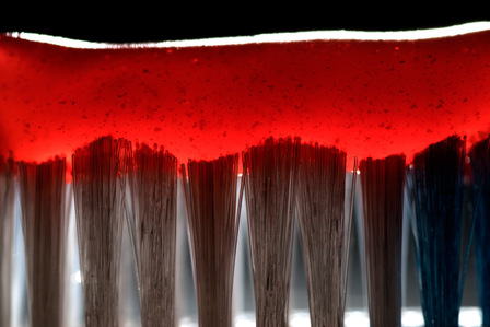A professional photoshoot of an extreme macro shot of creative toothbrush taken by top product photographer ashish gurbani based in mumbai, india