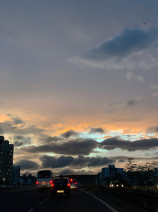 a professional quarantine shoot en route road travelling during sunset on a cloudy evening with a  golden lit sky shot by creative advertising photographer ashish gurbani based in mumbai india