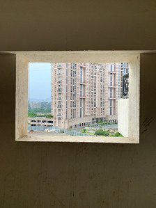 photograph of a building taken from an indoor view point through a window shot by best advertising photographer ashish gurbani based in pune india