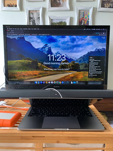 make shift office at home during quarantine photoshoot  of a computer kept on a wooden table shot by leading advertising photographer ashish gurbani based in Mumbai india