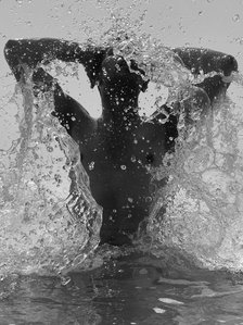 black and white water splash beach photoshoot with best male model atmaj vyas photography in black and white shoot by best fashion photographer based in mumbai india