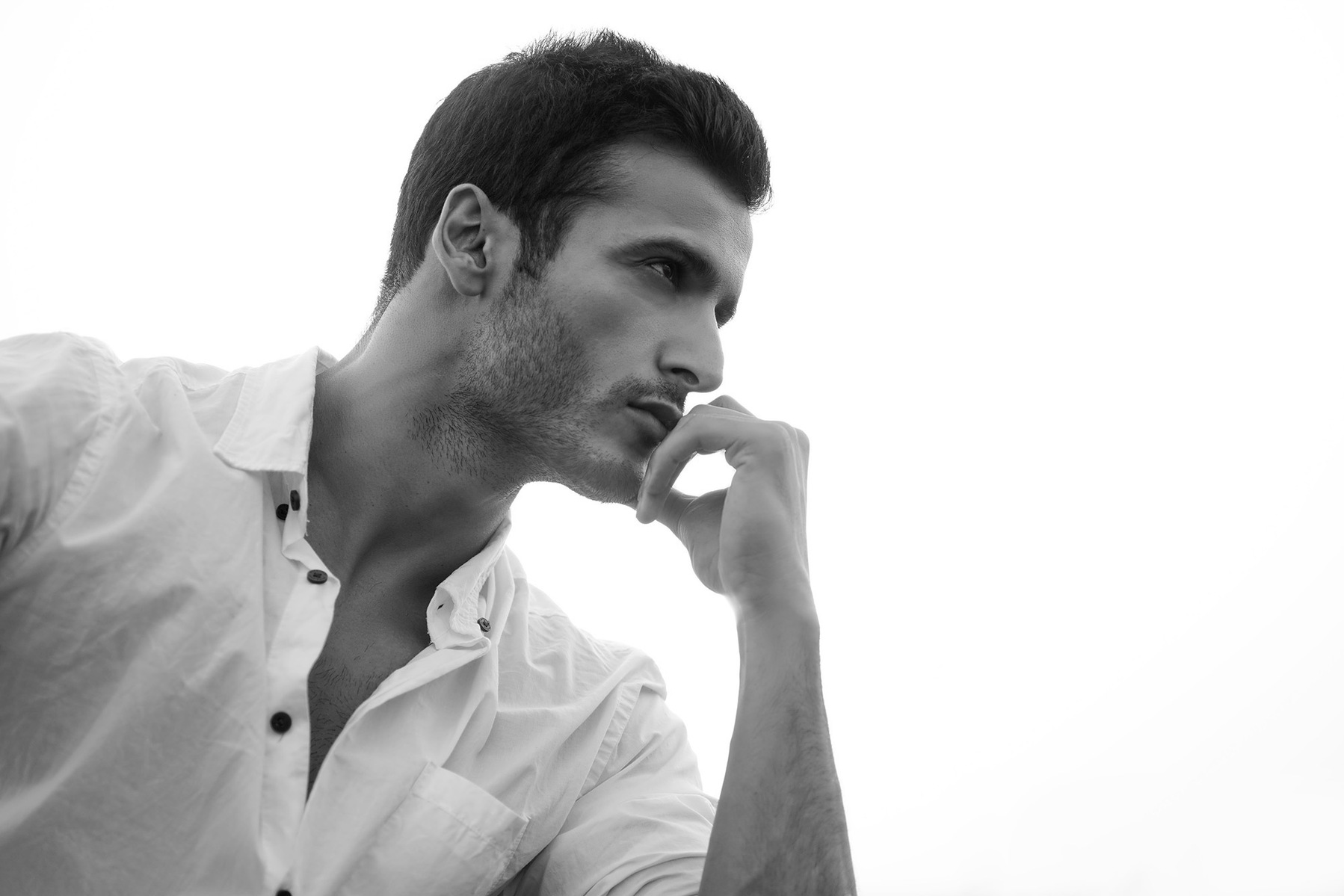 black and white intense portrait of leading indian fashion model shoot sitting in front of the sunlight photoshoot best fashion photographer based in mumbai india