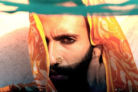 male model in Rajasthani dupatta flying styling conceptual project photoshoot by best indian advertising photographer based in mumbai india