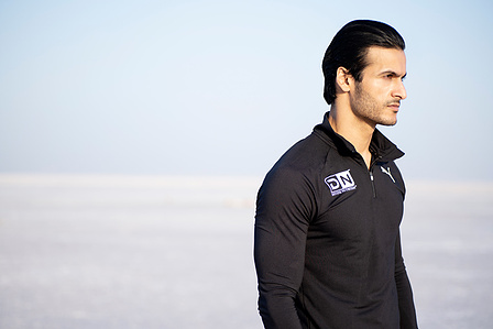 male fitness model posing at the rann of kutchch in Gujarat india for golds gym leading gym brand photoshoot with the best fashion photographer based in mumbai india