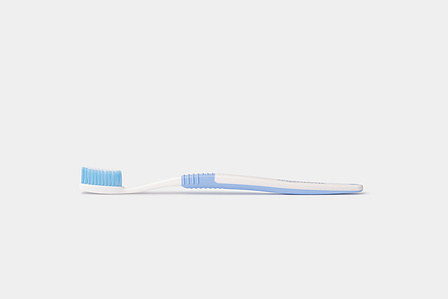 A side angle professional product photoshoot of a toothbrush on plain white background for a website layout shot by leading still life photographer ashish gurbani based in Pune and Mumbai India.