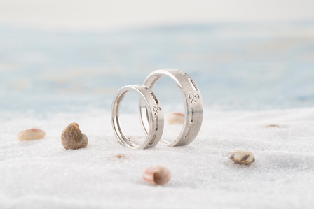two rings one story concept jewellery photoshoot in studio setup with white background shot by best jewellery photographer ashish gurbani based in bangalore india