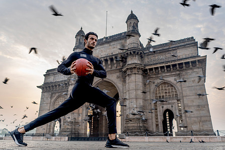 a beautiful sunrise workout session by the gateway of india photography assignment shoot by the top indian advertising photographer based in new york and mumbai
