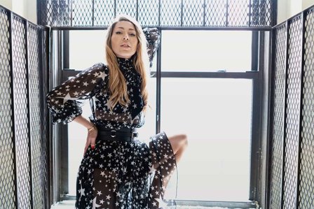 Russian model wearing designer clothing on a firescape based in New York shot by Best fashion and advertising photographer from Mumbai Santacruz Mumbai