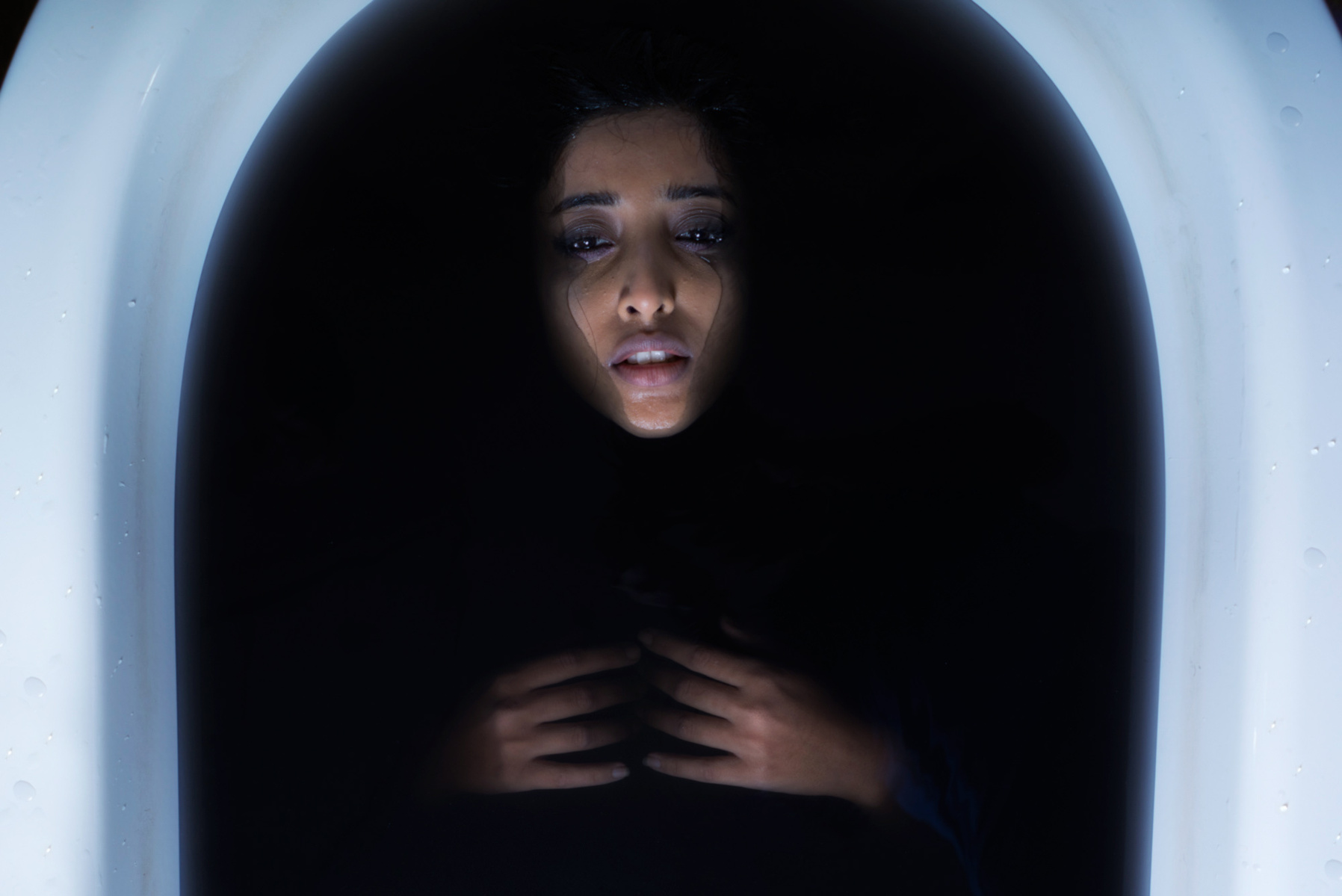 girl in black water tub photoshoot photography concept photographer by ashish gurbani based in mumbai santacruz east india pune