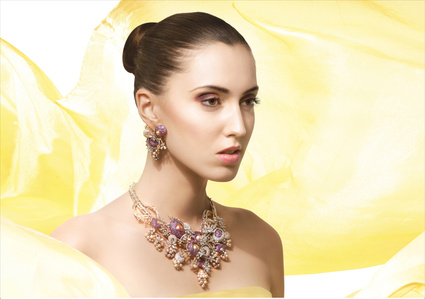 yellow fabric concept background with top model wearing jewellery by pune based brand rathod jewellers in shoot with best advertising photographer specialising in jewellery photographer based in mumbai india