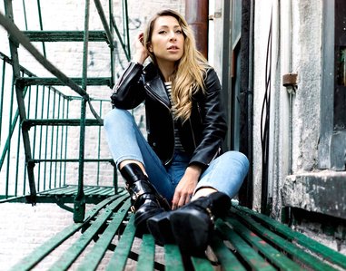 Russian model  and stylist sitting on stairs wearing designer clothing based in New York shot by most creative fashion and advertising photographer from Mumbai Santacruz Mumbai