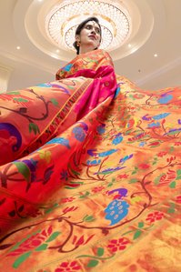 flowy orange saree conceptual photography for best indian saree fabric designer brand ​Kasat Exclusive shoot by leading fashion photographer based in mumbai india