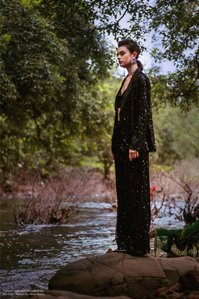 Fashion model Melissandre gazing at a stream of water shot by Ashish Gurbani leading fashion photographer based in Mumbai India.