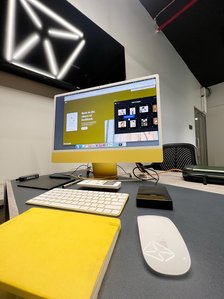 inside a photographer studio working on sendign files and backing up branding and advertising images compiled by lifestyle photos in pune india
