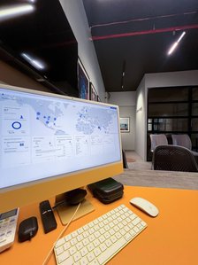 working on google analytics on a computer in the leading lifestyle photography studio near me pune