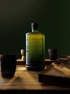moody best whiskey photography on wooden set with harsh lighting concept shoot in mumbai india