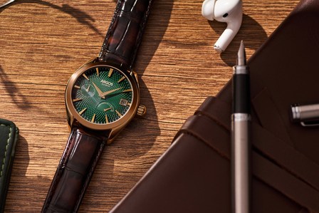 a close up cocktail watch placed ona a wooden table at home on a sunny day photographed by best product photographer in india