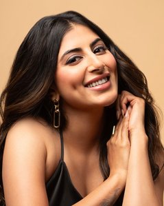 close up portrait of a beautiful model with dimples by leading jewellery photography studio in pune
