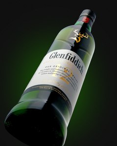 creative bottle photography of Glenfiddich 12 floating on a conceptual green background in Mumbai India