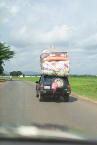 Car carrying a heavy load of mattresses shot by Ashish Gurbani leading fashion photographer based in Mumbai India.