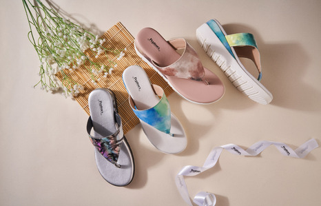 colorful slippers kept on a set designed for a brand campaign photoshoot with leading digital photographer
