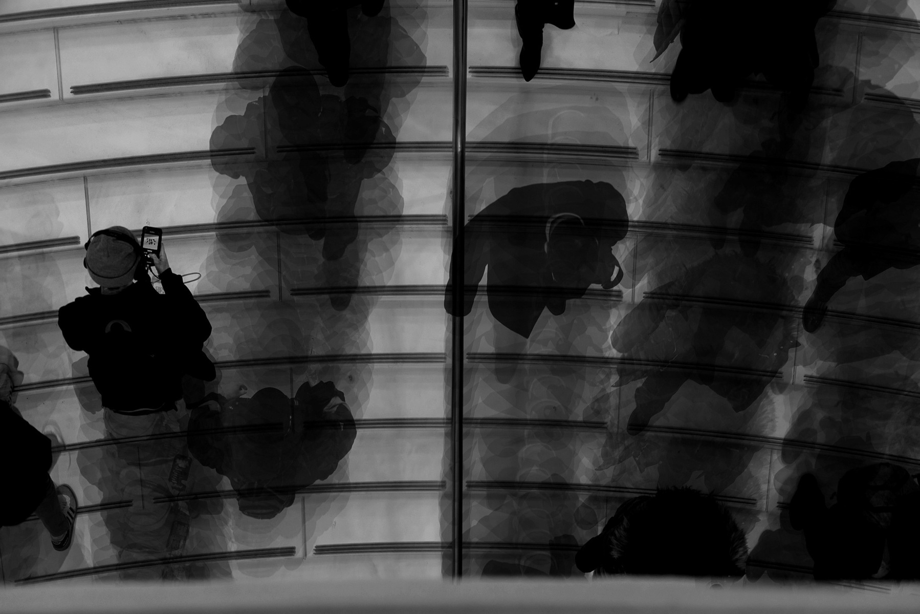 a conceptual photo series of street photography of pre-covid times of a rush of people on stairs in black and white professionally shot by best advertising photographer ashish gurbani based in pune india