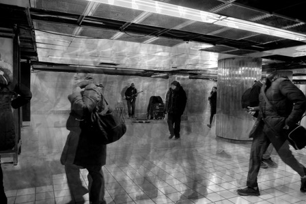 professional photograph of street photography in pre-covid times of a rush of people in black and white shot by best conceptual photographer ashish gurbani based in pune india