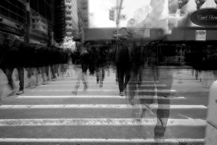photo series of street photography of pre-covid times of a rush of people walking on a zebra crossing in black and white  concept professionally shot by best advertising photographer ashish gurbani based in pune india