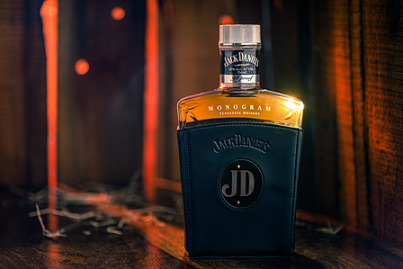 a professionally shot high end creative retouching jack daniels whiskey bottle product photoshoot in studio setup for brand advertising campaign by best luxury product photographer ashish gurbani based in pune india