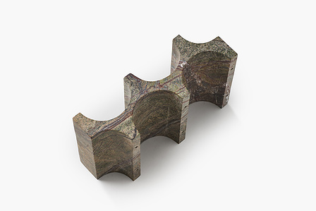 an artistic creative shaped stone whiskey bottle holder shot by leading digital photographer