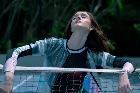 gorgeous fashion model posing in tennis court with net conceptual photoshoot with leading advertising photographer based In mumbai india