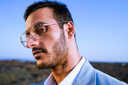 close up portrait photography of top fashion model angel singh on a rocky beach terrain brand advertising campaign for designer with leading advertising photographer based in mumbai india