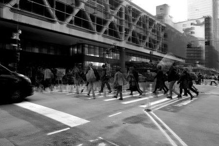 street photography of pre-covid times of a rush of people on a zebra crossing in black and white a conceptual photo series professionally shot by leading advertising photographer ashish gurbani based in pune india