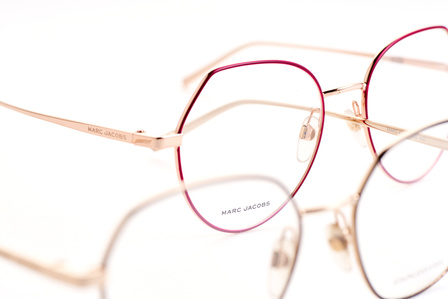 two eyewear spectacles overlapping in a white background studio setup photography by top product photographer based in pune india