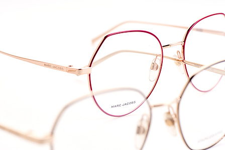 two eyewear spectacles overlapping in a white background studio setup photography by top product photographer based in pune india