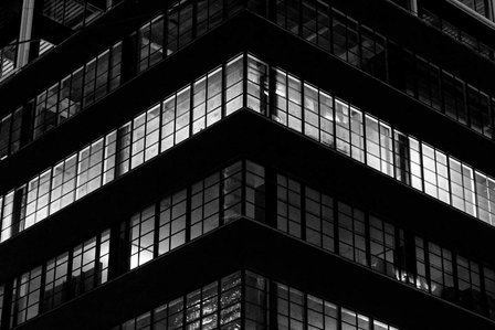 dark city New York city architecture office building with lights on after work hours shot by best advertising photographer based in mumbai india 