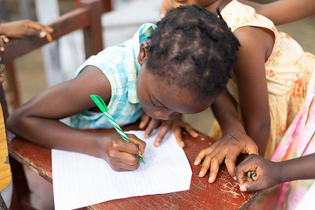 Young girl focussed on her studies shot by Ashish Gurbani top photographer based in Mumbai India.